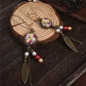 Bohemian bead and charm mandala dangle earrings